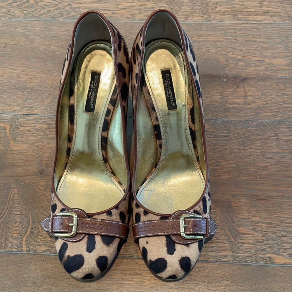 Dolce & Gabbana cheetah pumps with a buckle.